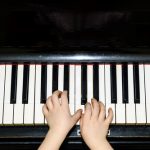 Beginner practising piano